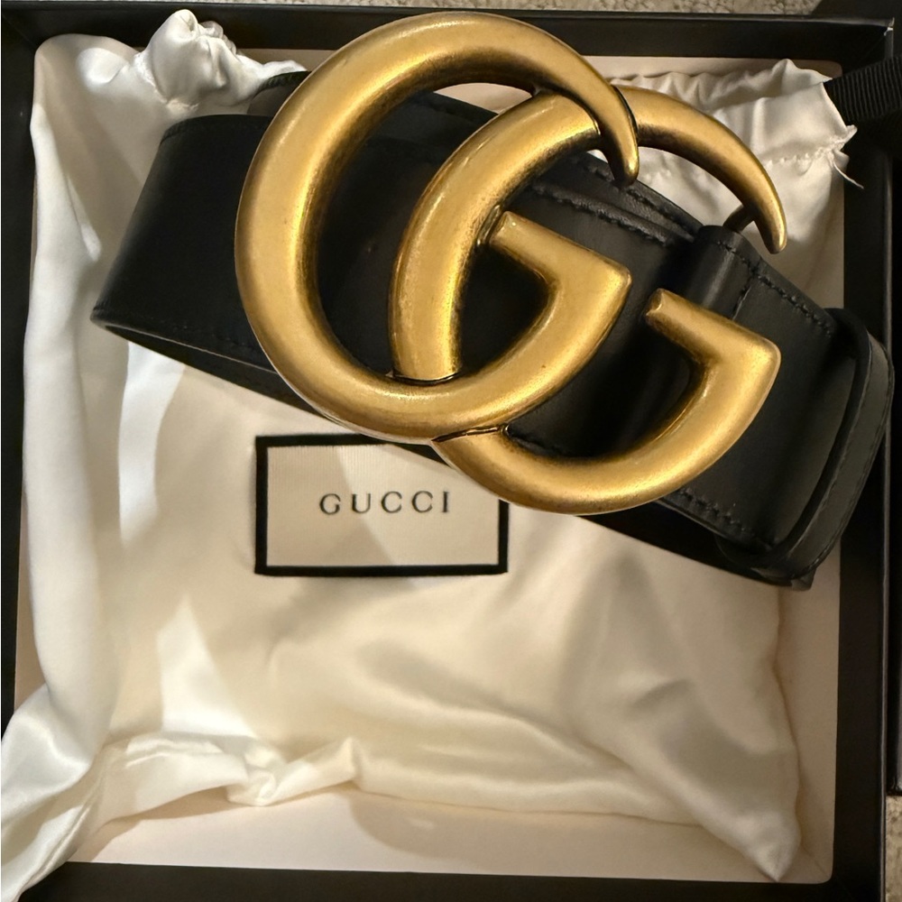 Gucci Black and Gold Belt with Iconic GG Buckle